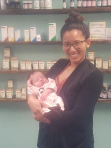 Dr. Vy Simeles holding baby Sophia Grace Lockwood